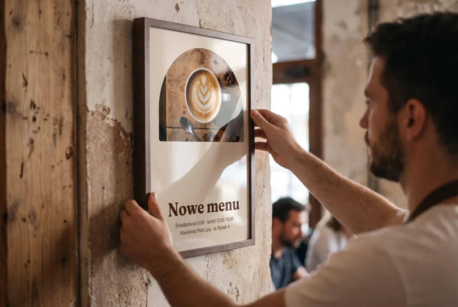 Plakat, który wiesza się w ramie
